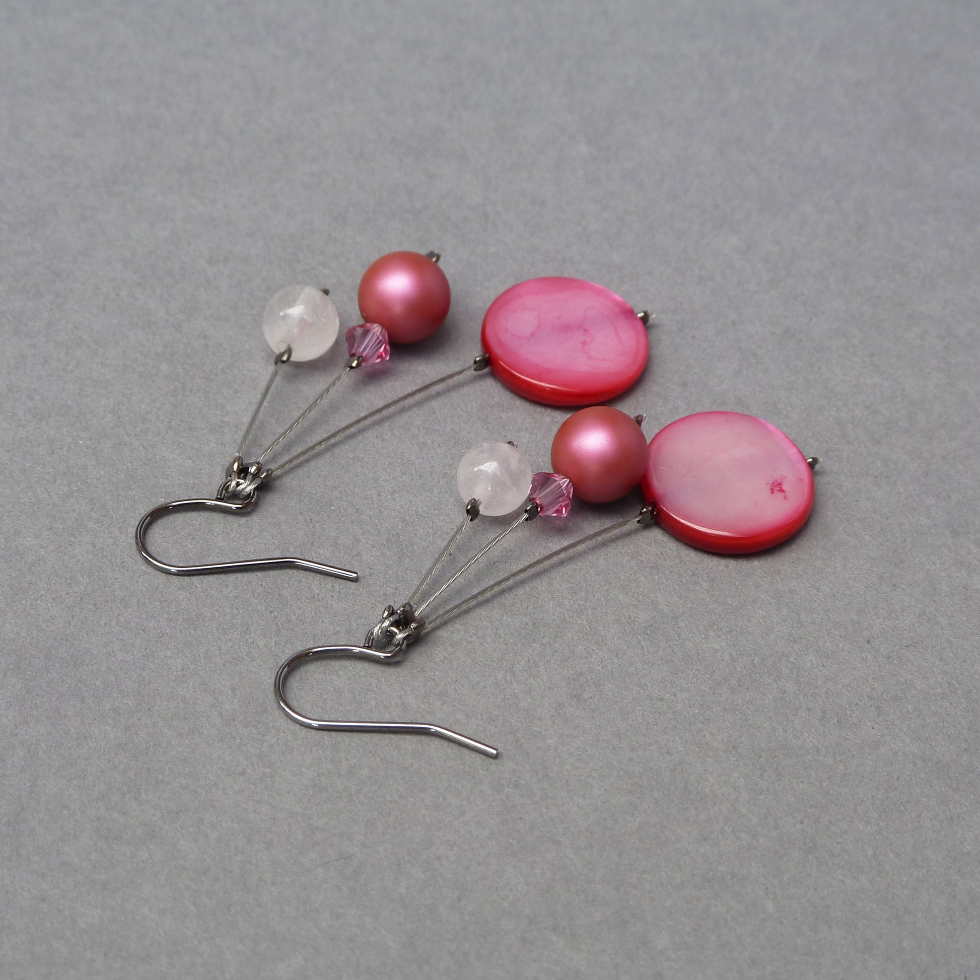 Dark pink dangle earrings