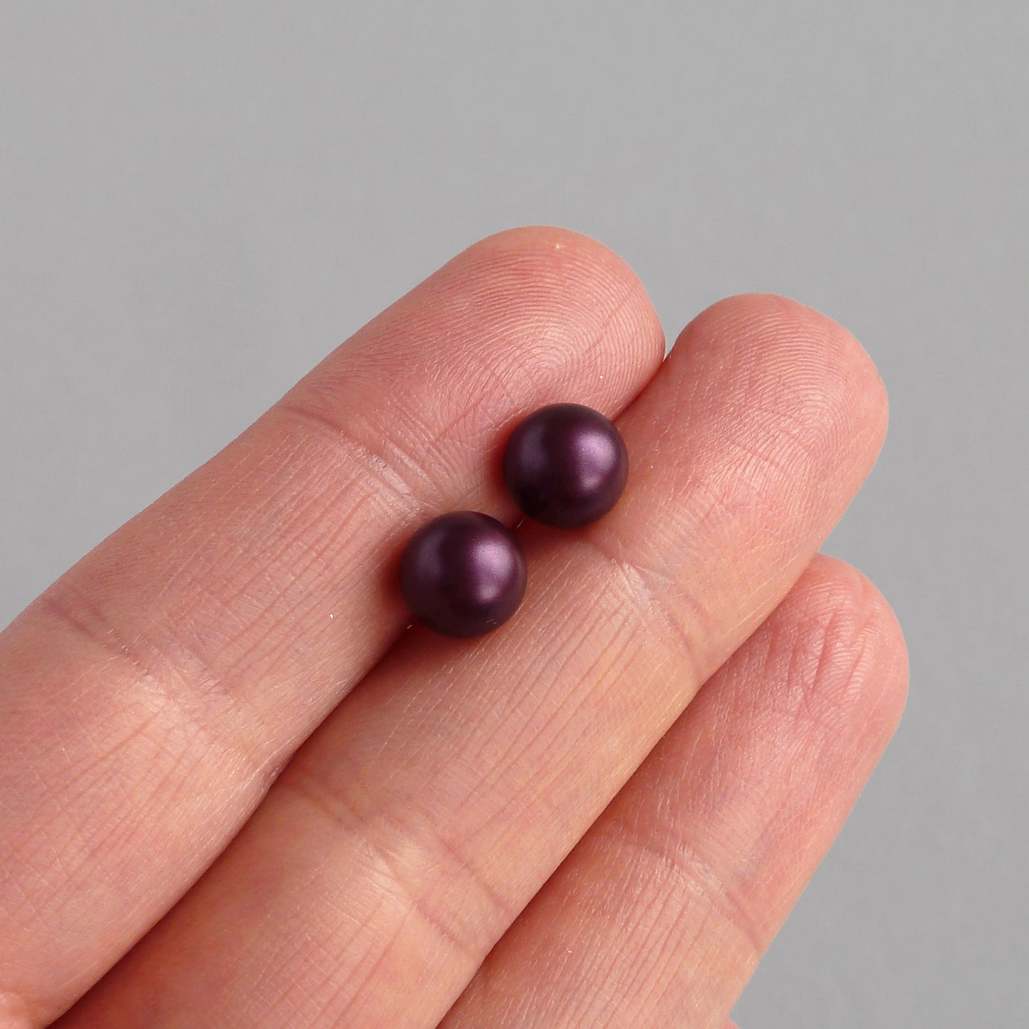Dark purple stud earrings