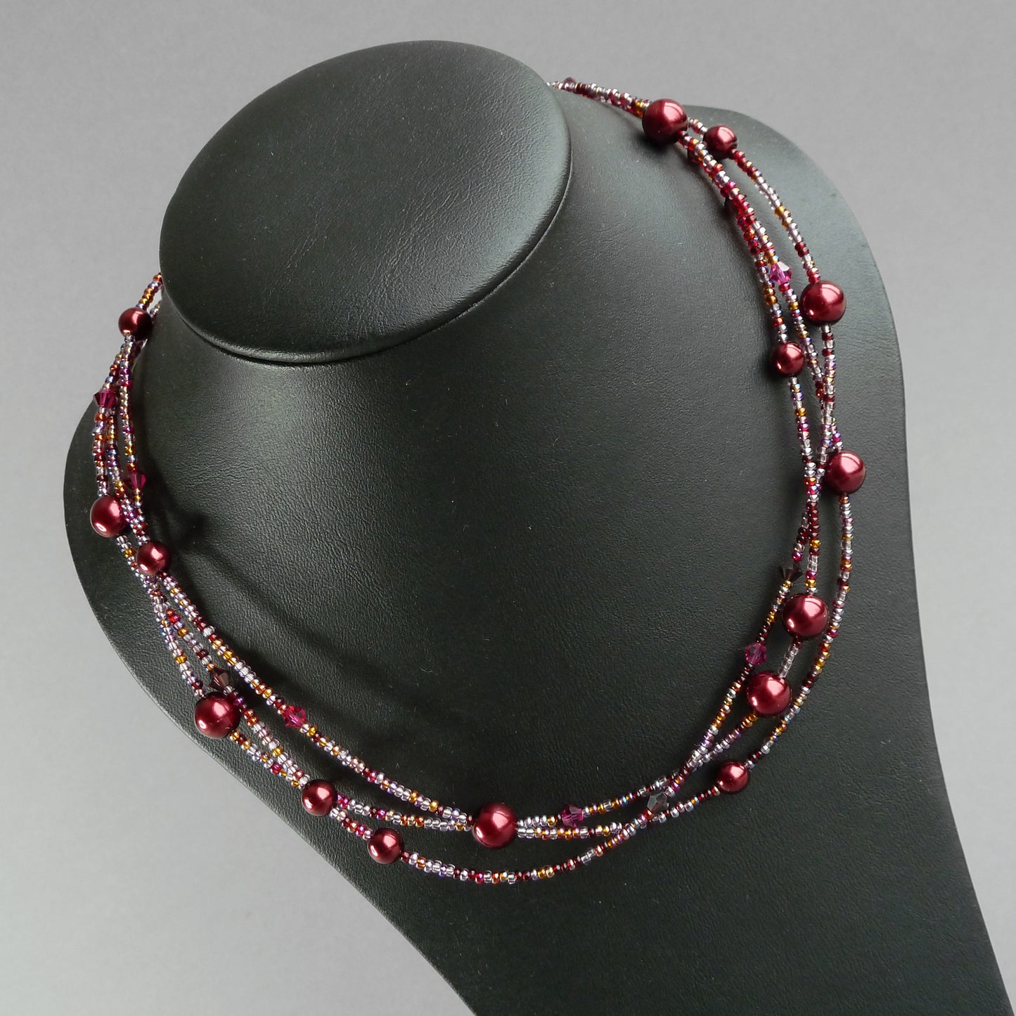 Dark red multi strand necklace