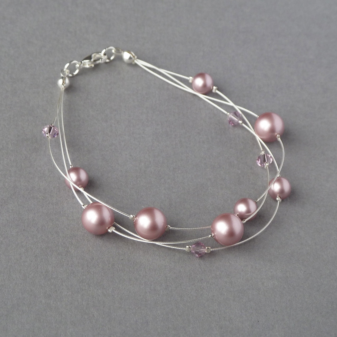 Dusky pink floating pearl bracelet