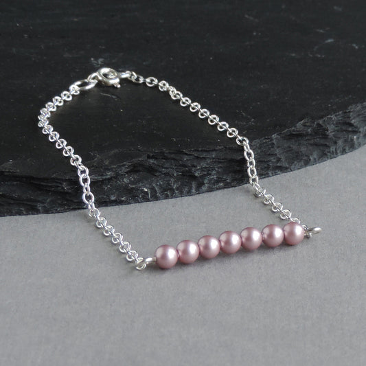 Dusky pink pearl layering bracelet