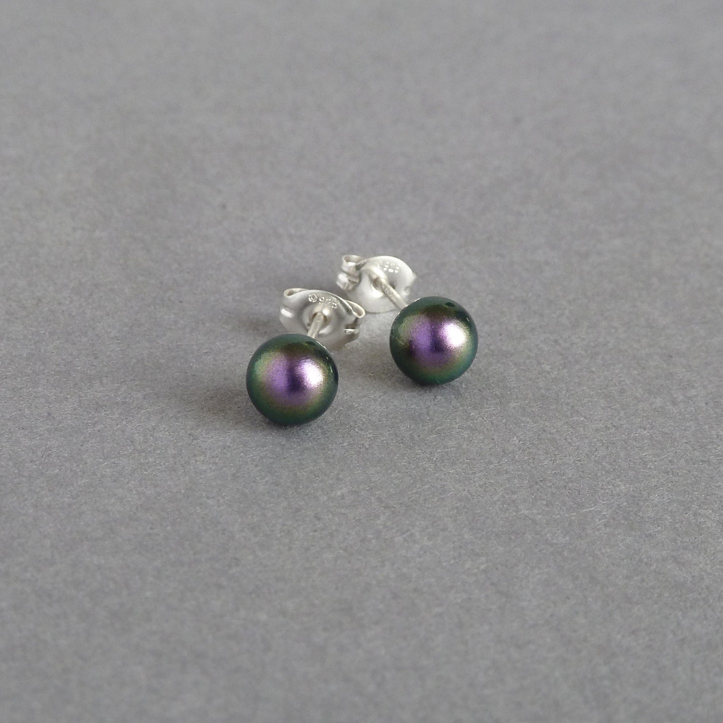 Iridescent purple pearl studs