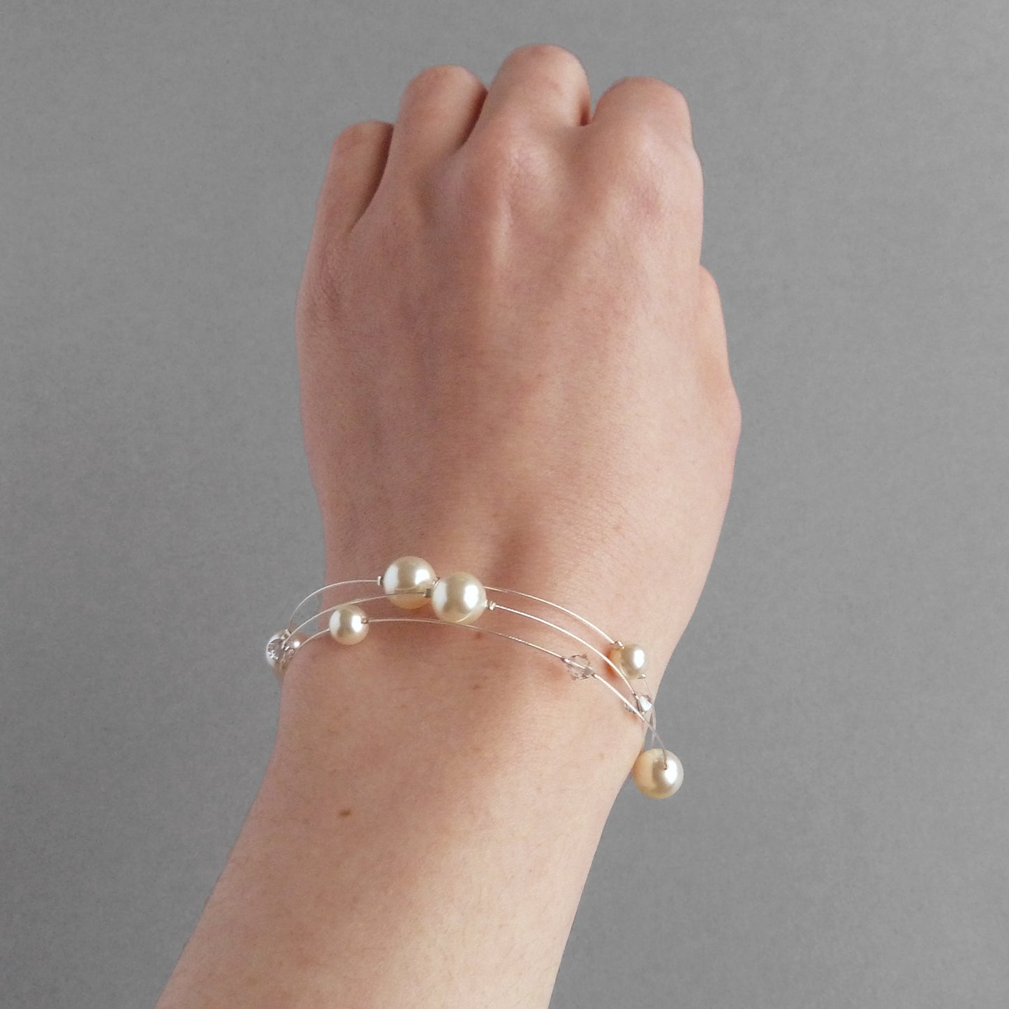 Ivory multi strand pearl bracelet