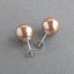 Large rose gold pearl stud earrings
