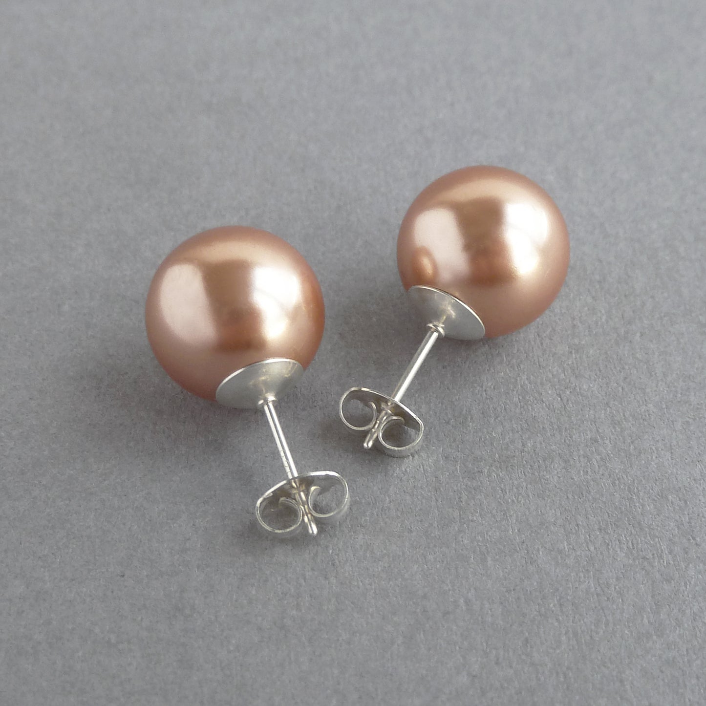 Large rose gold pearl stud earrings