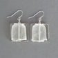 Large white glass dangle earrings