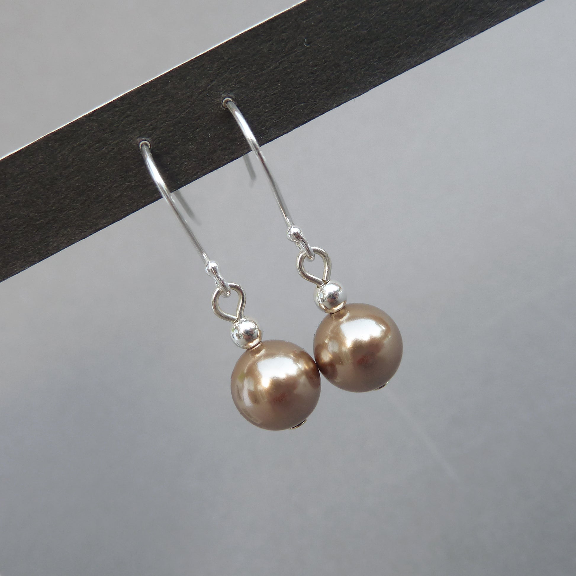 Light brown pearl dangle earrings