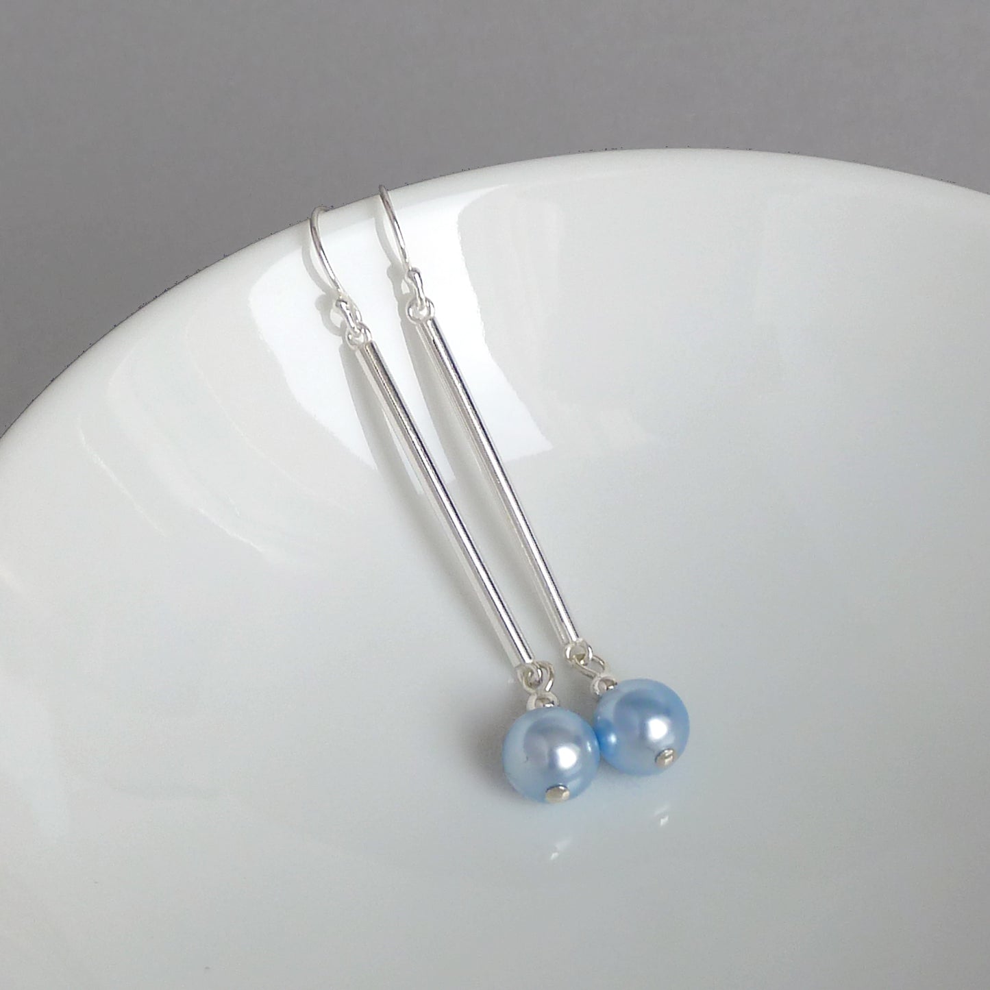 Long baby blue pearl earrings