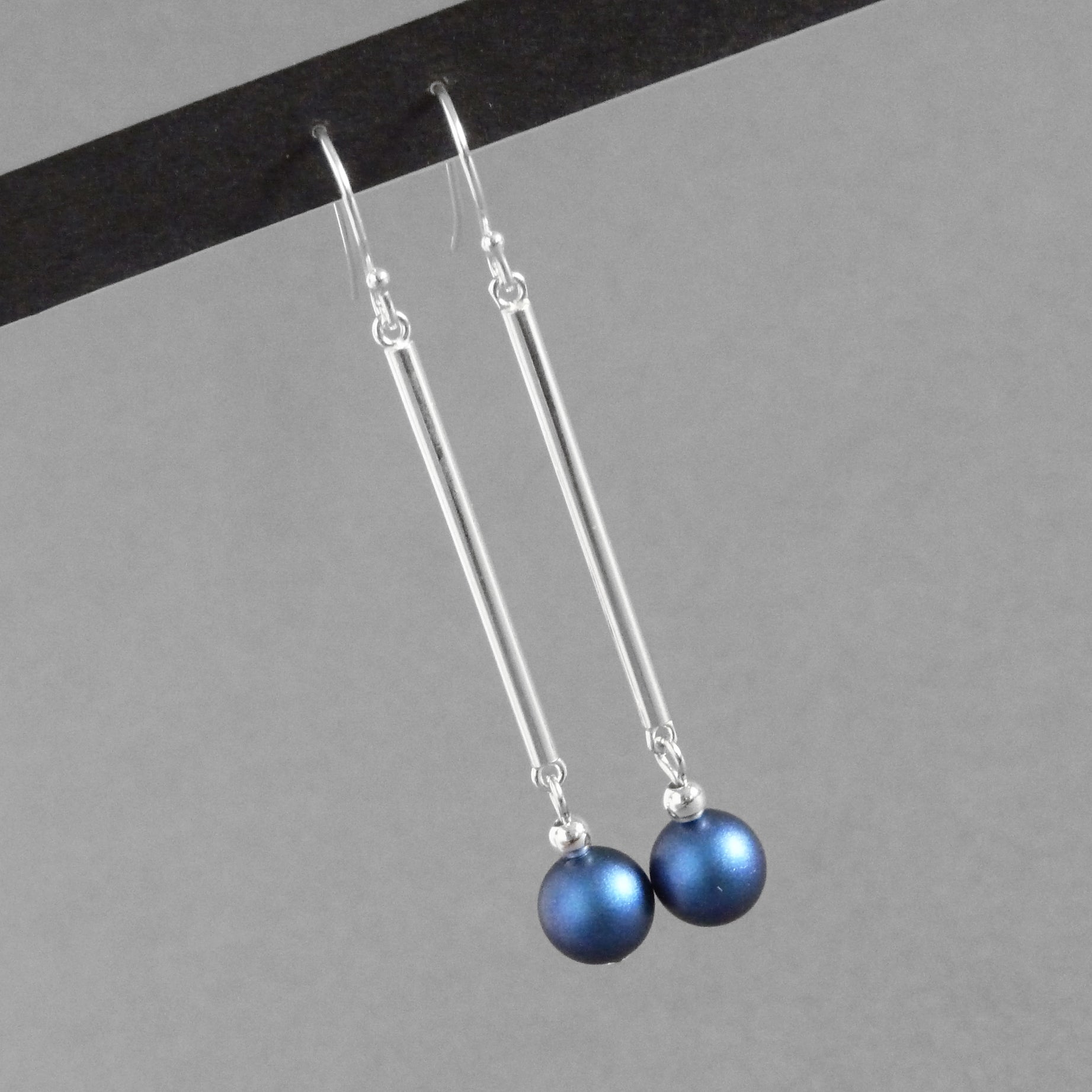 Long blue pearl drop earrings