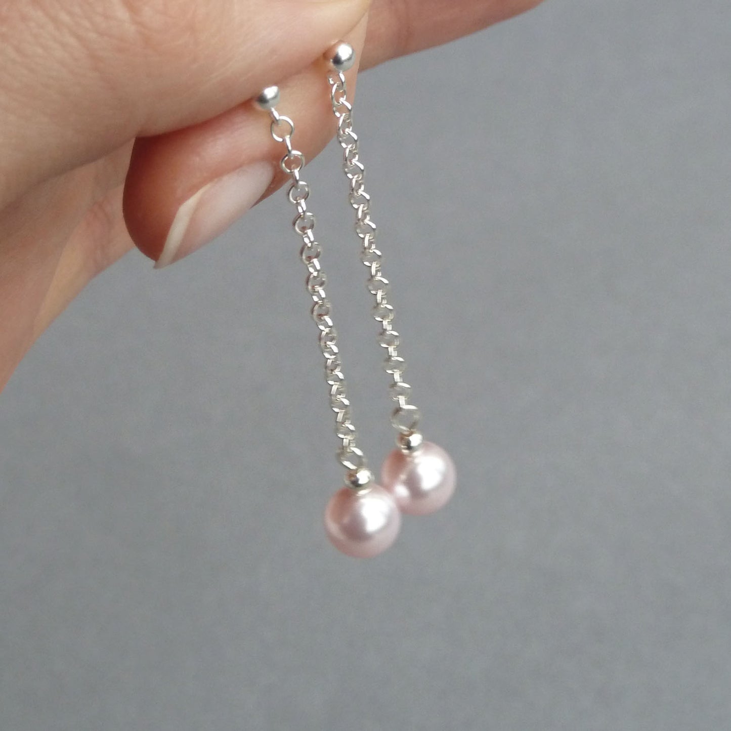 Long blush pink pearl earrings