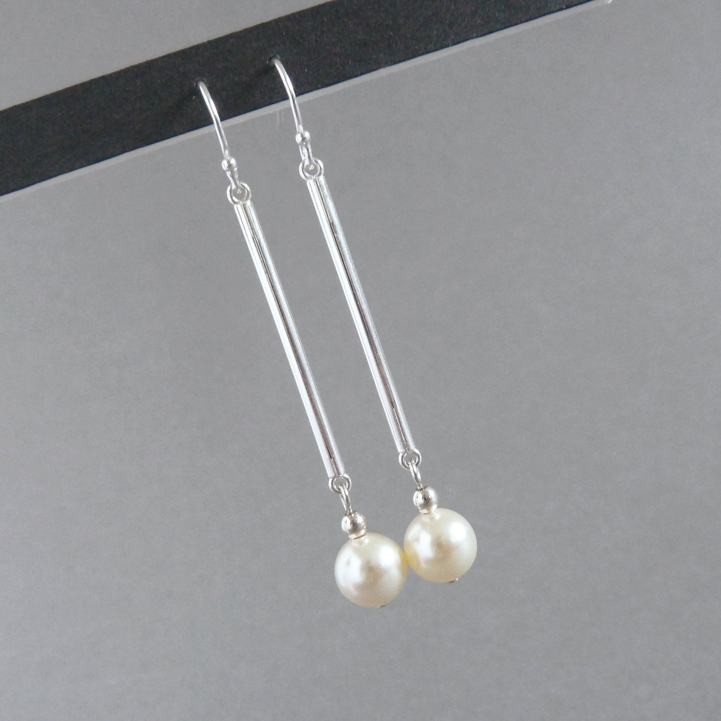 Long cream dangle earrings