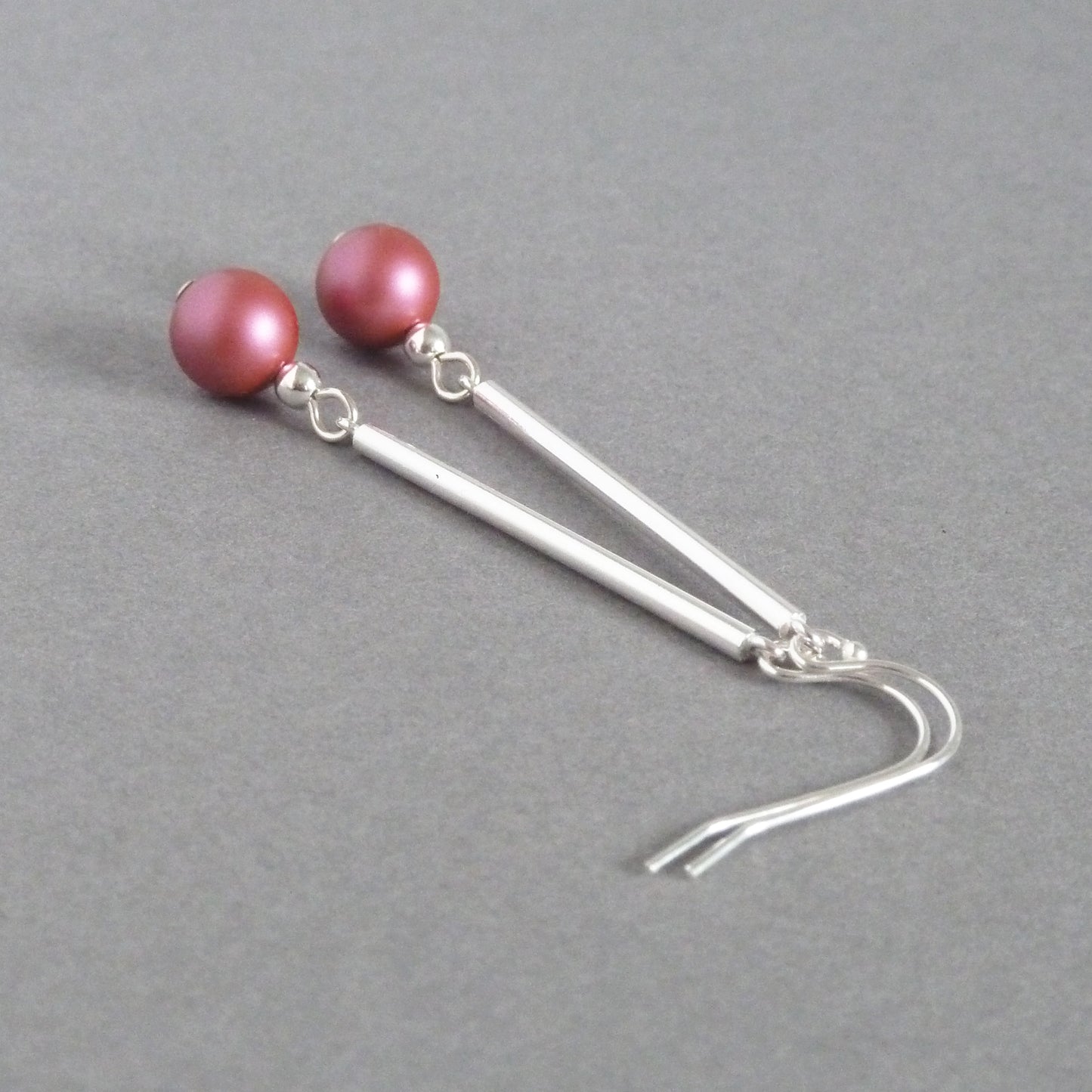 Long dark pink drop earrings