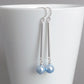 Long light blue pearl earrings