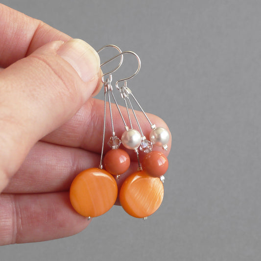 Long orange earrings