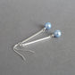 Long pale blue pearl earrings