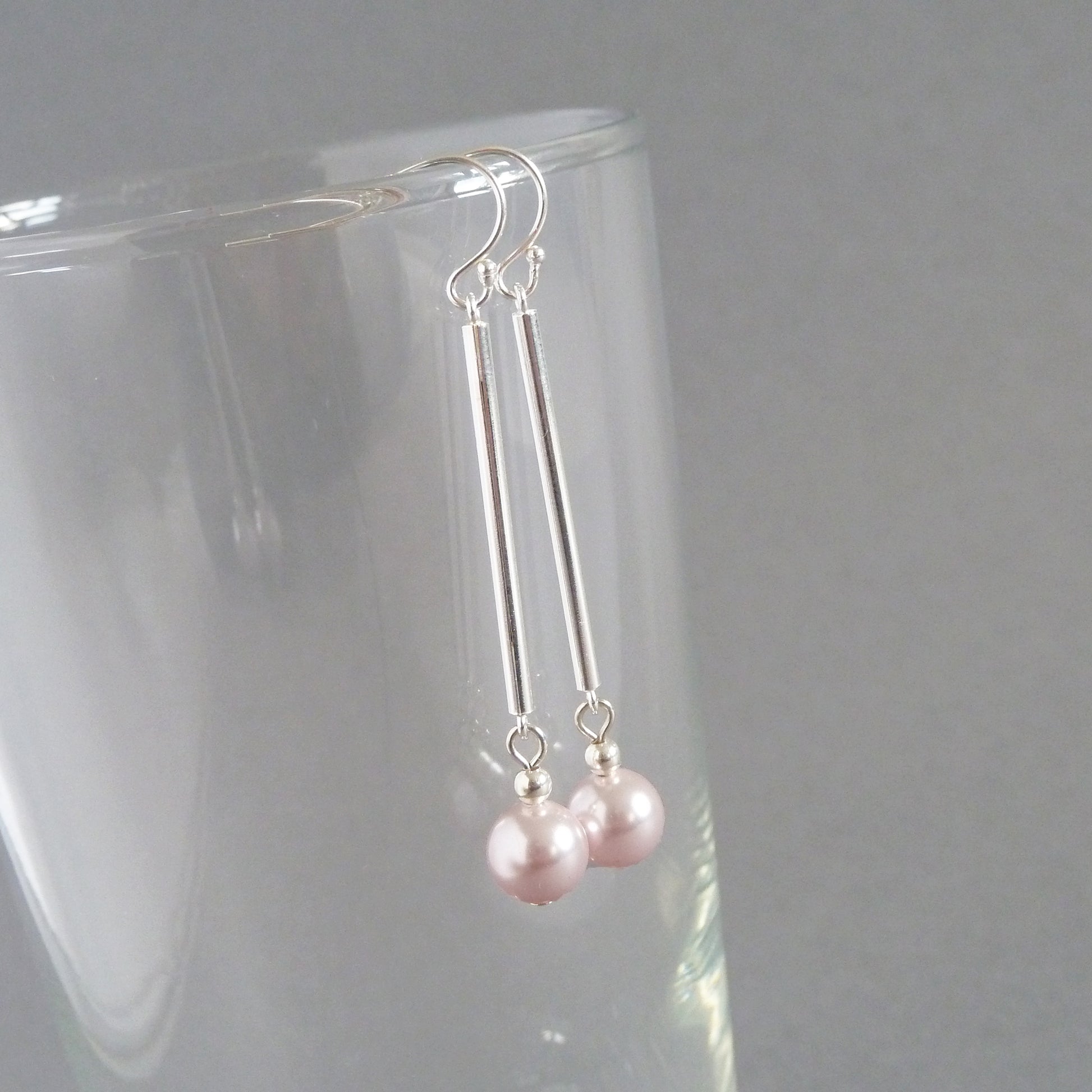 Long pale pink pearl earrings