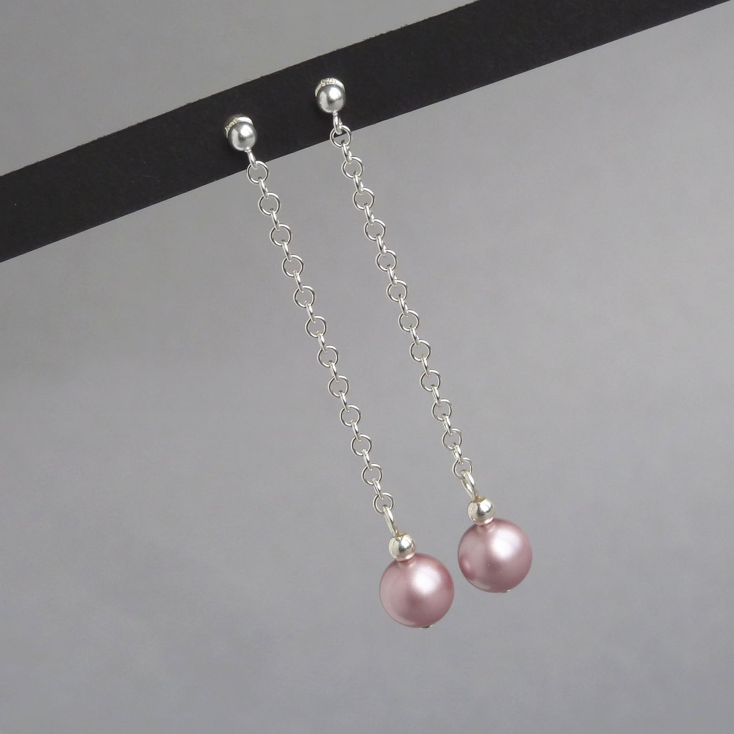 Long rose pink pearl earrings