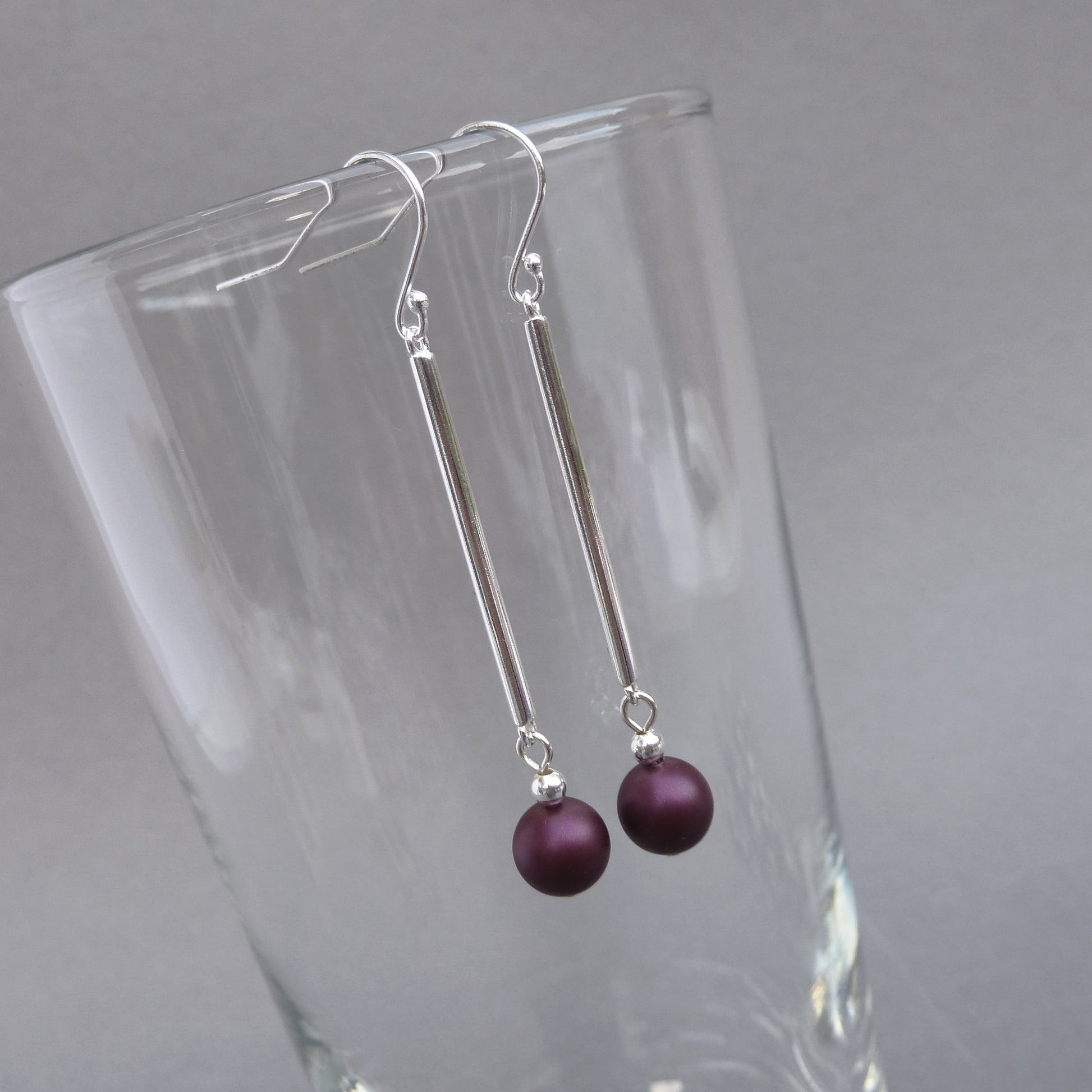 Long silver bar and plum drop earrings