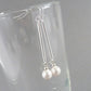 Long white pearl dangle earrings