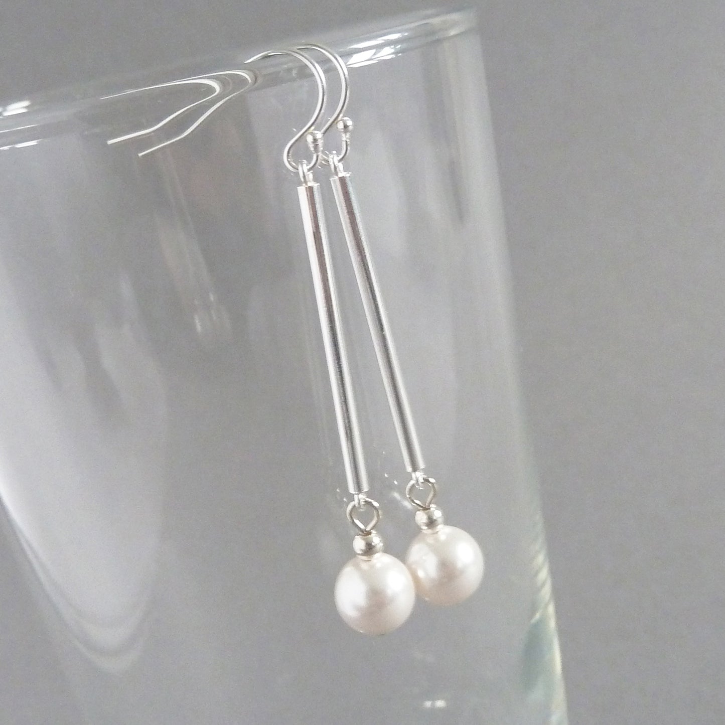 Long white pearl dangle earrings