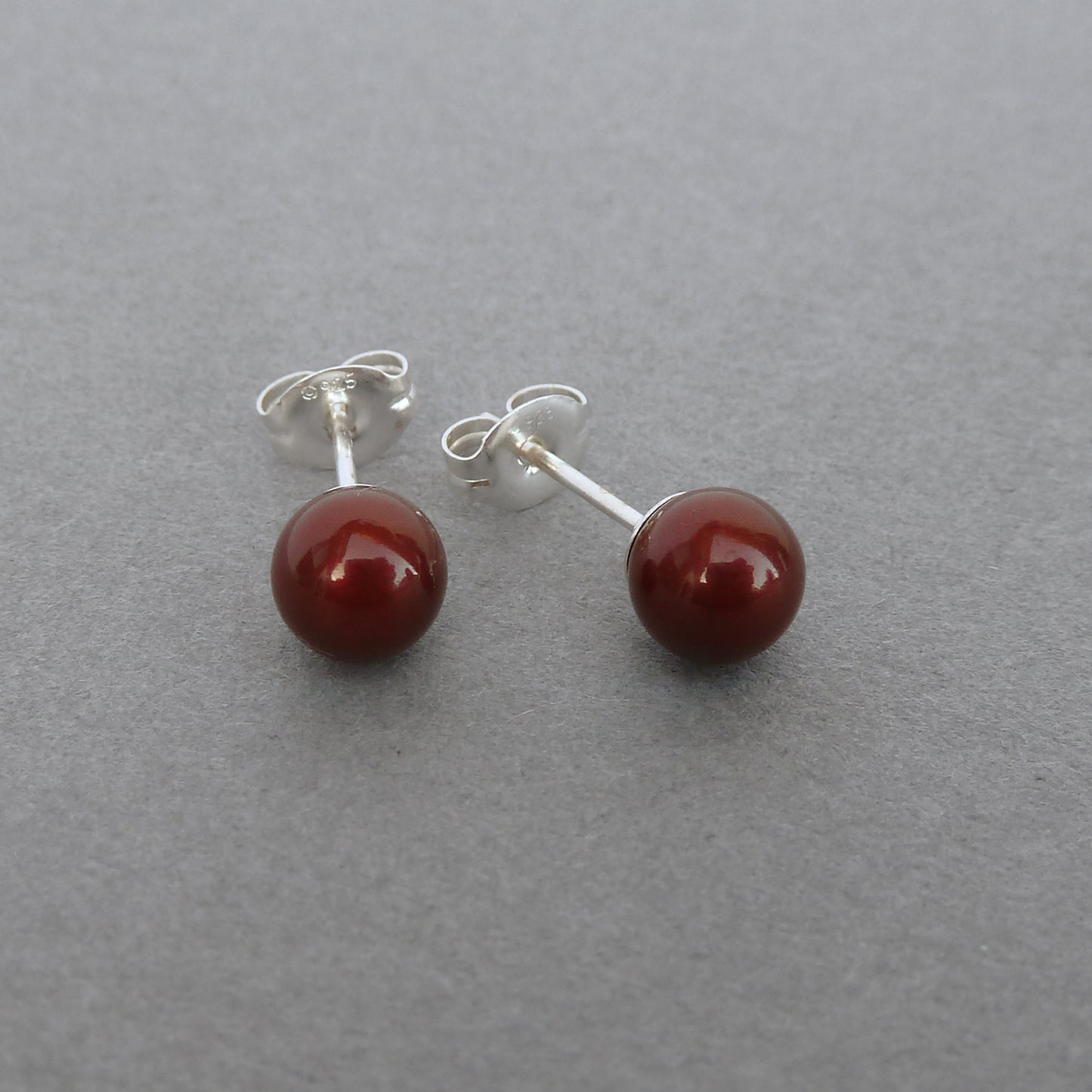 Maroon pearl stud earrings