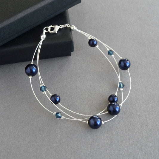 Navy blue floating pearl bracelet