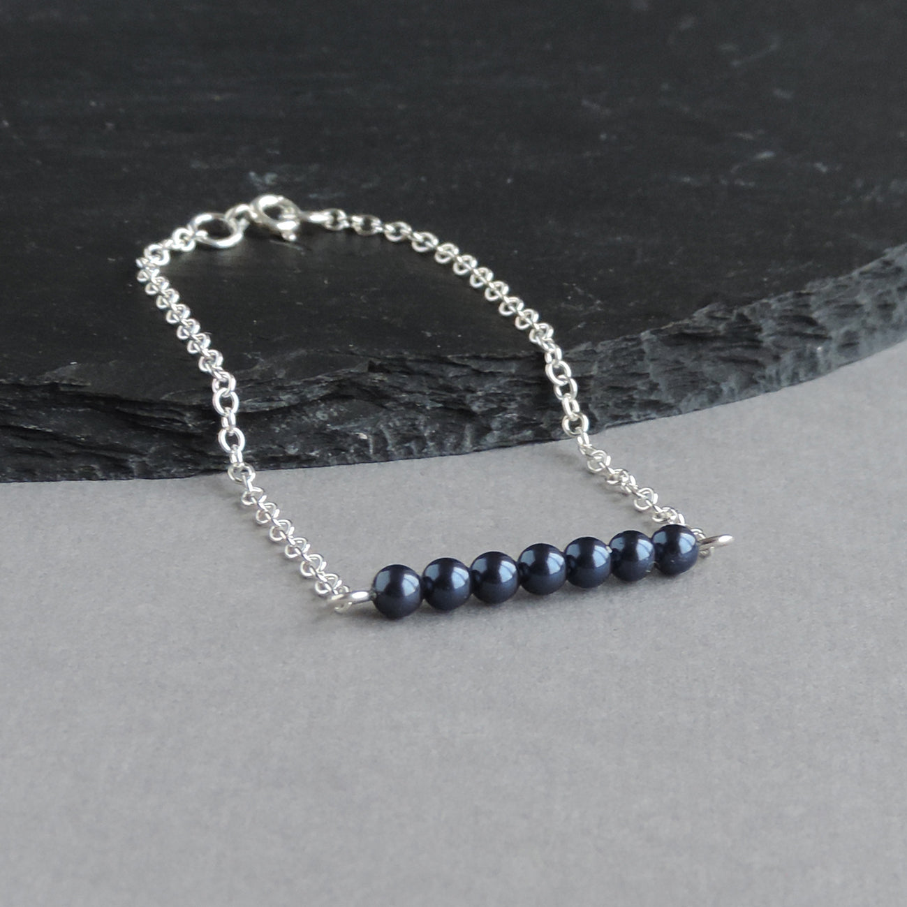 Navy pearl layering bracelet