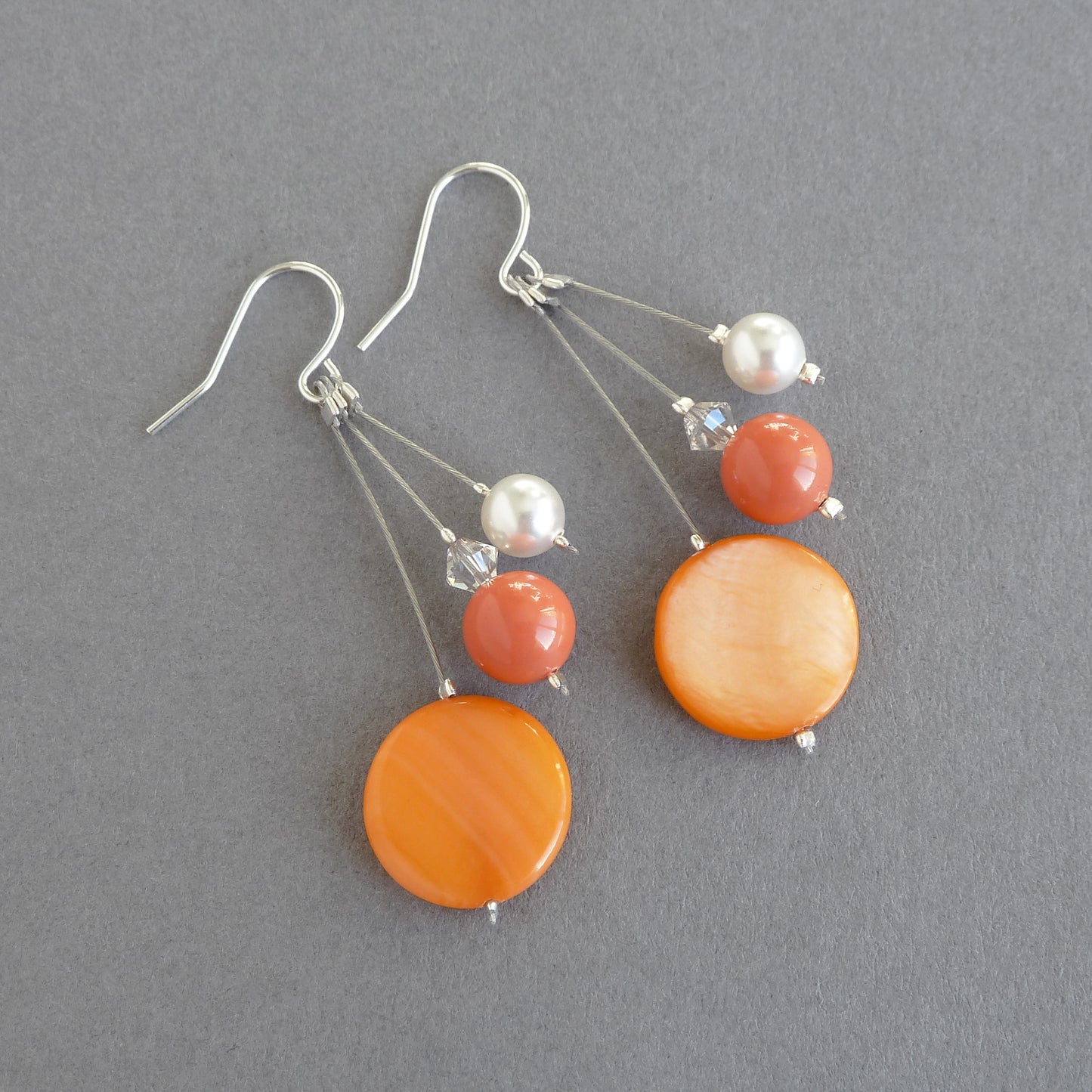 Orange dangly earrings