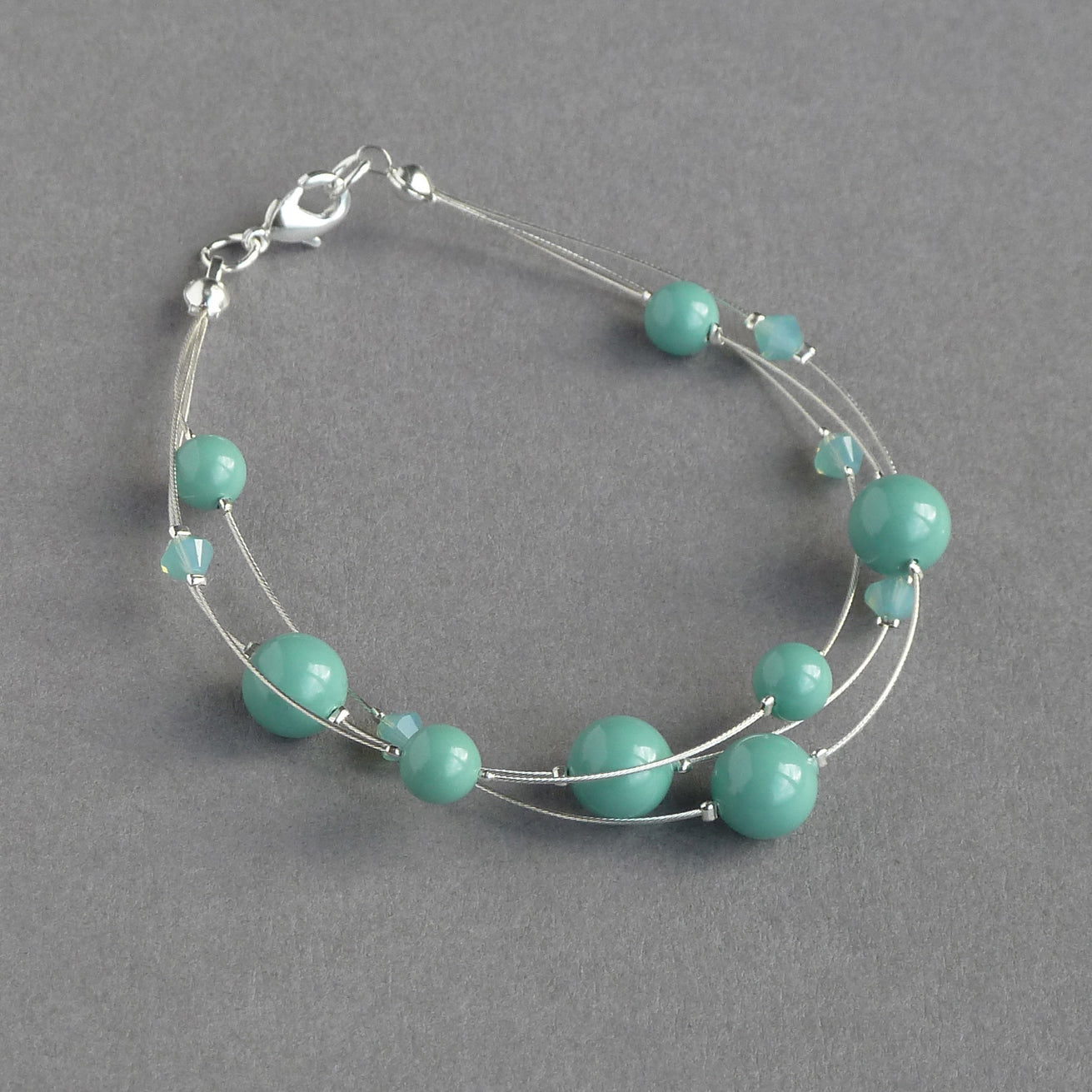 Pale teal floating pearl bracelet