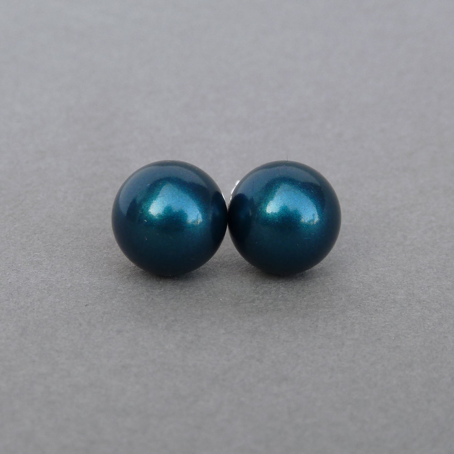 Chunky peacock green pearl stud earrings