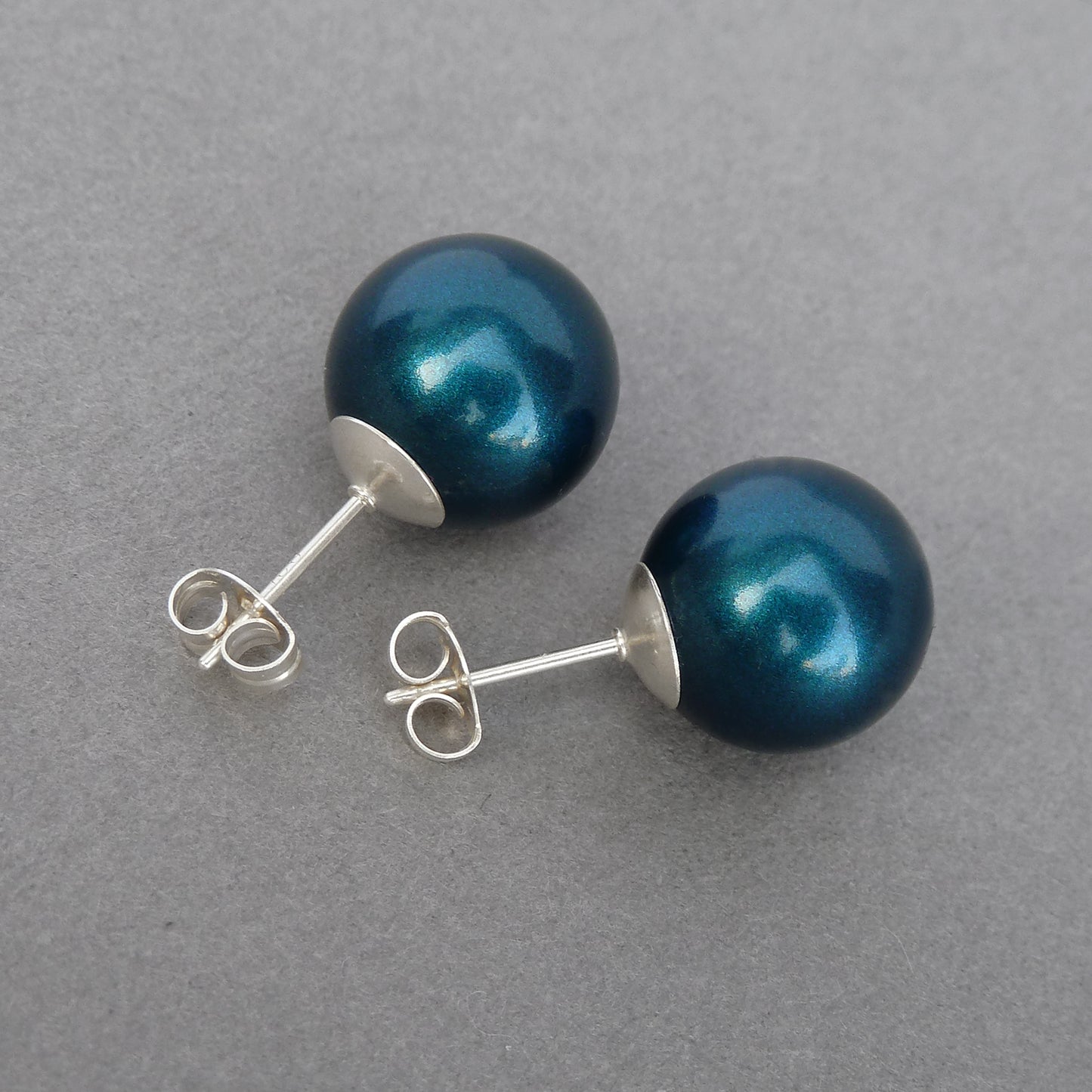 Large petrol blue pearl studs