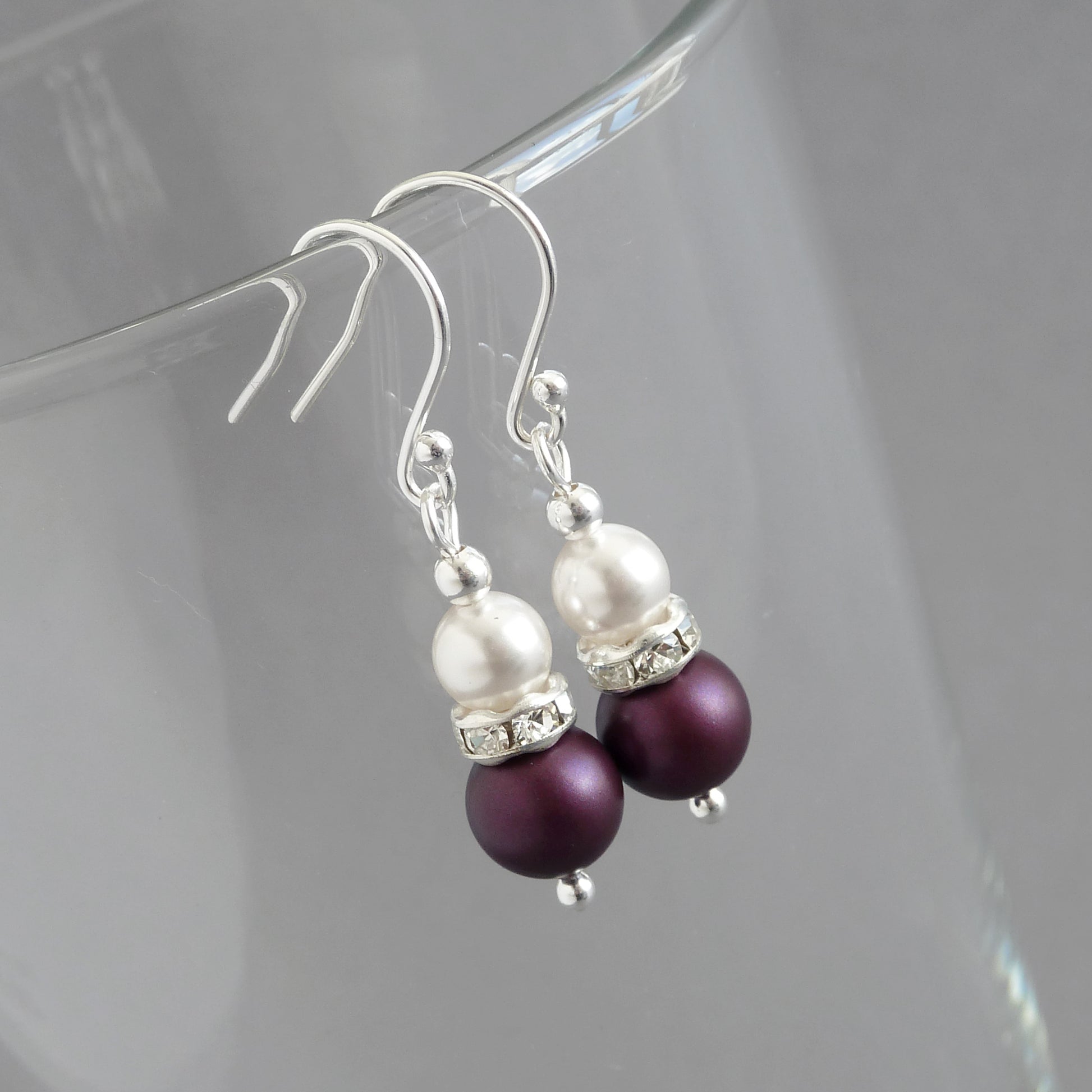 Plum pearl drop earrings with silver hooks