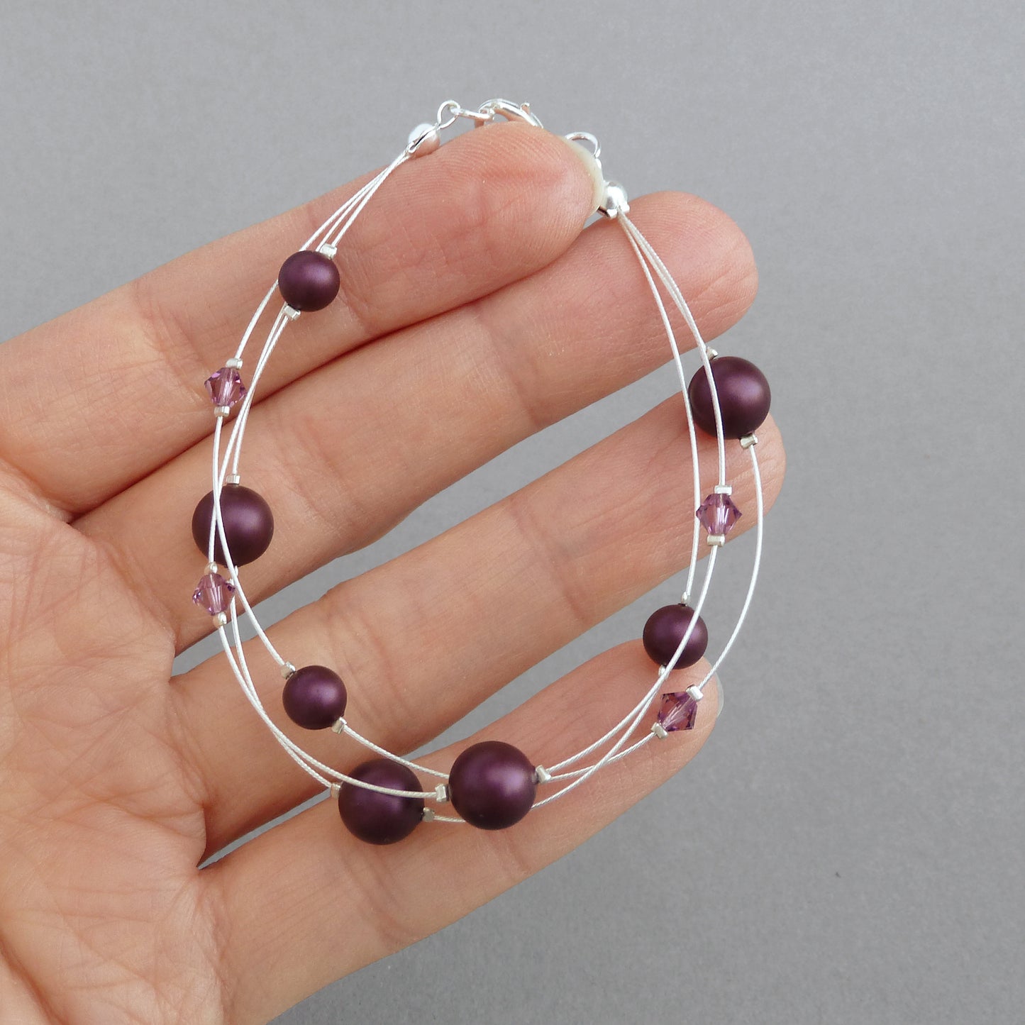 Plum floating pearl bracelet