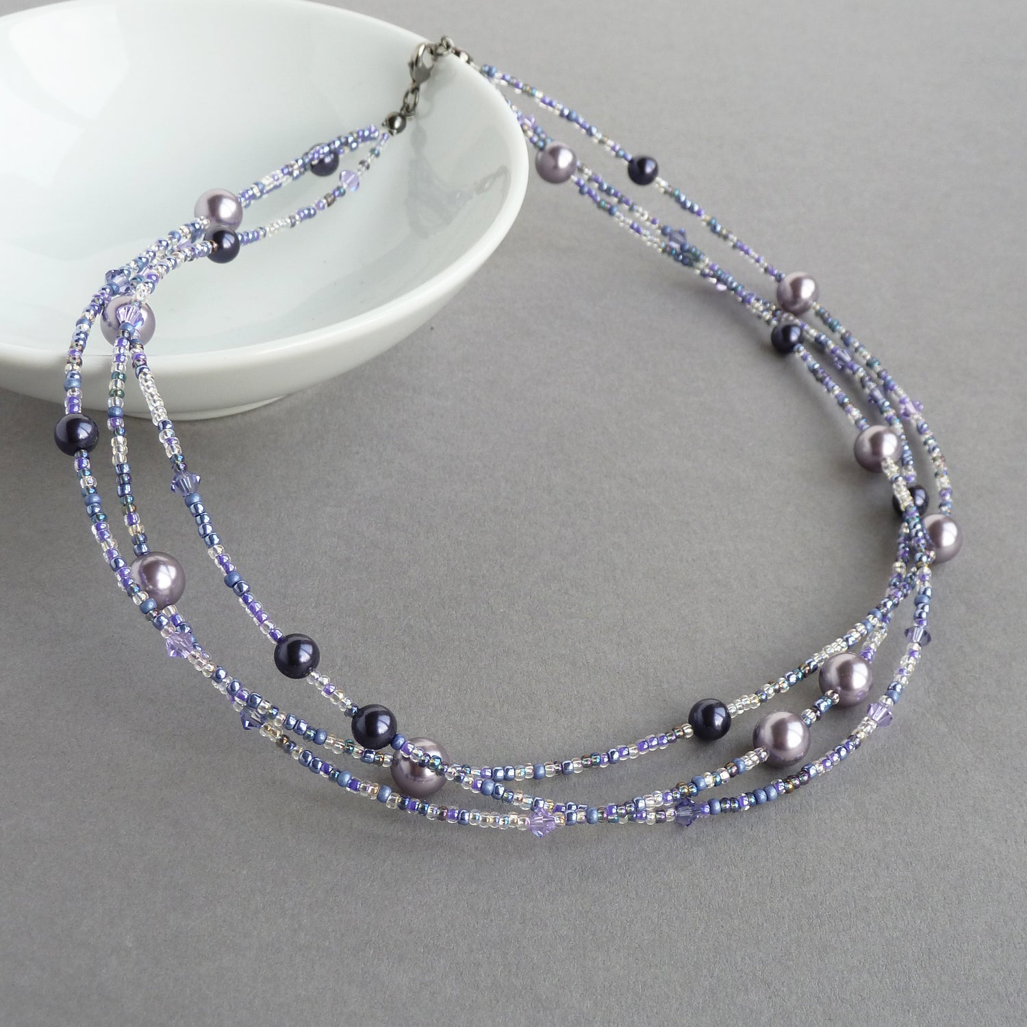 Purple three strand necklace