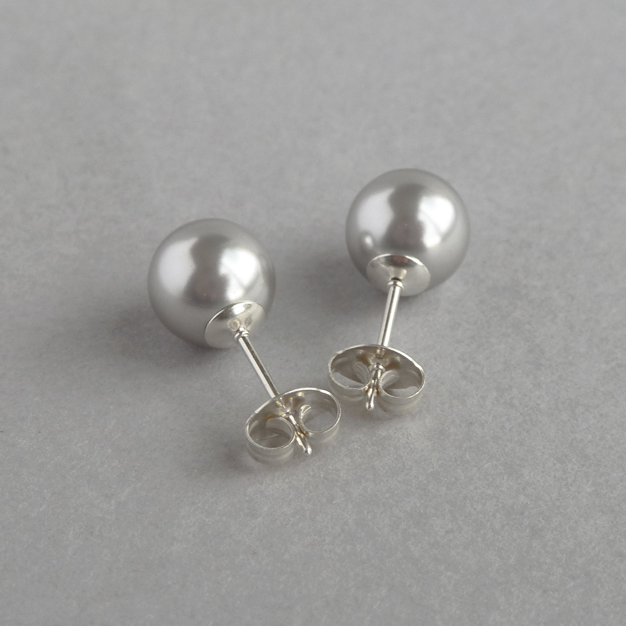 Silver on sale pearl studs