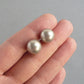 Round taupe pearl stud earrings