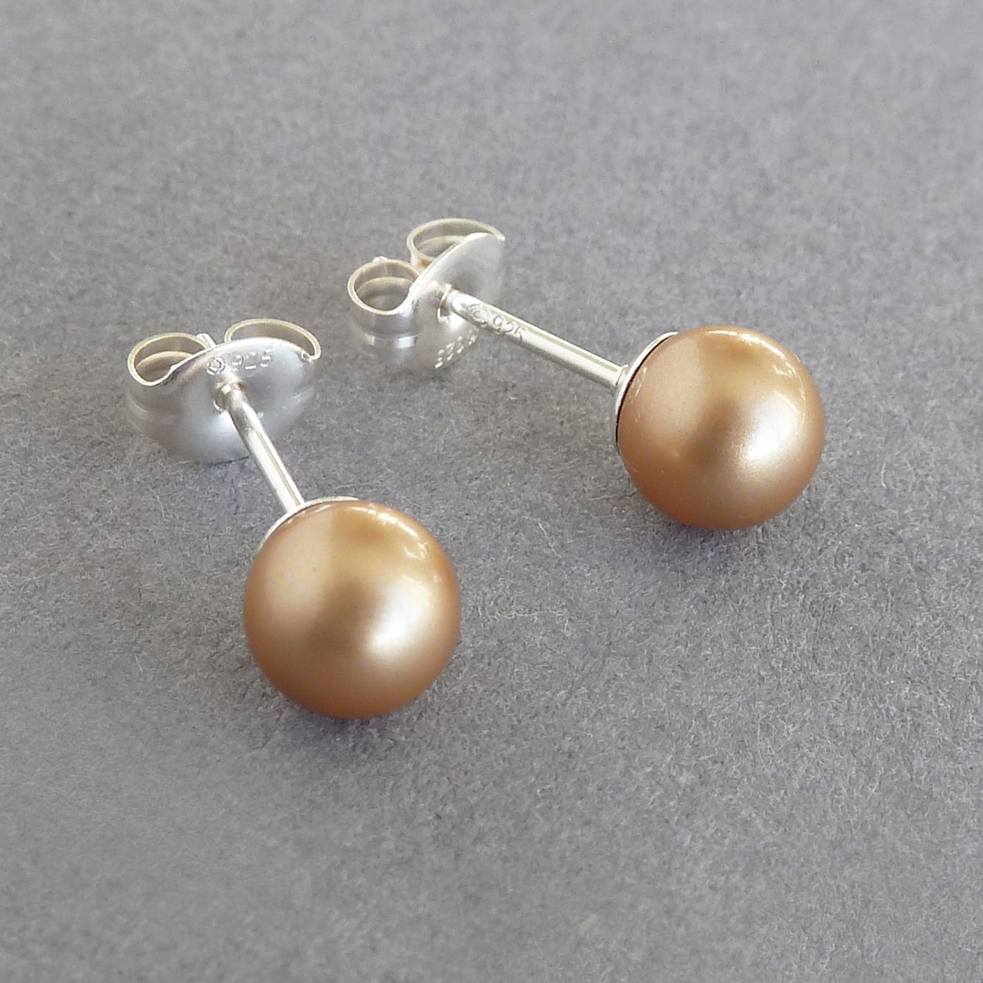 Satin gold pearl stud earrings