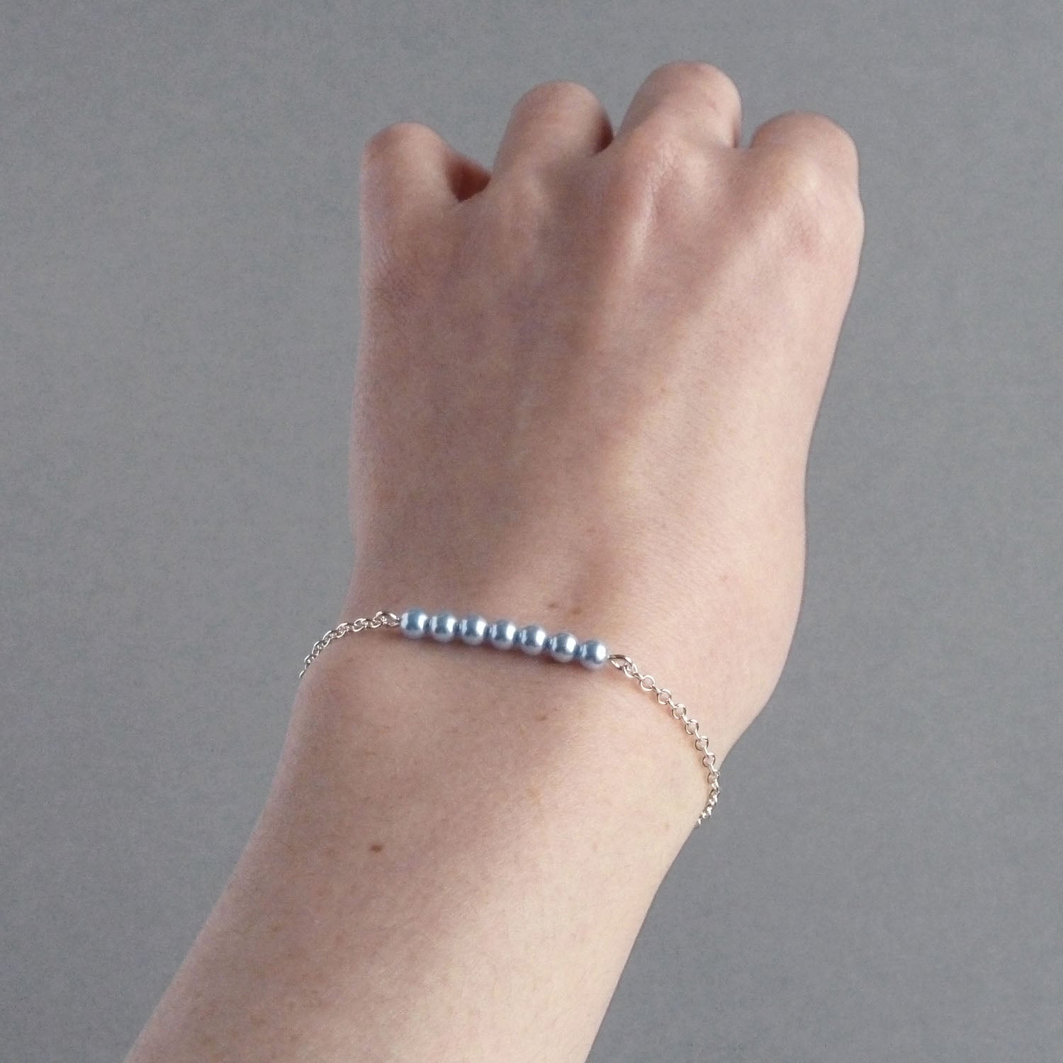 Silver chain and baby blue pearl bracelet