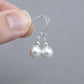 Simple dangly white pearl earrings
