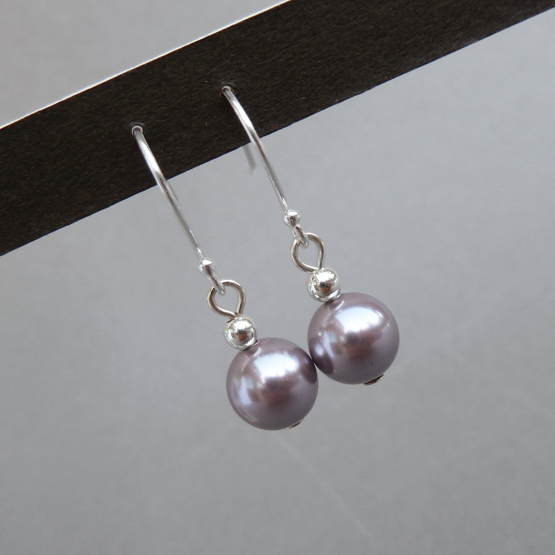 Simple mauve pearl drop earrings