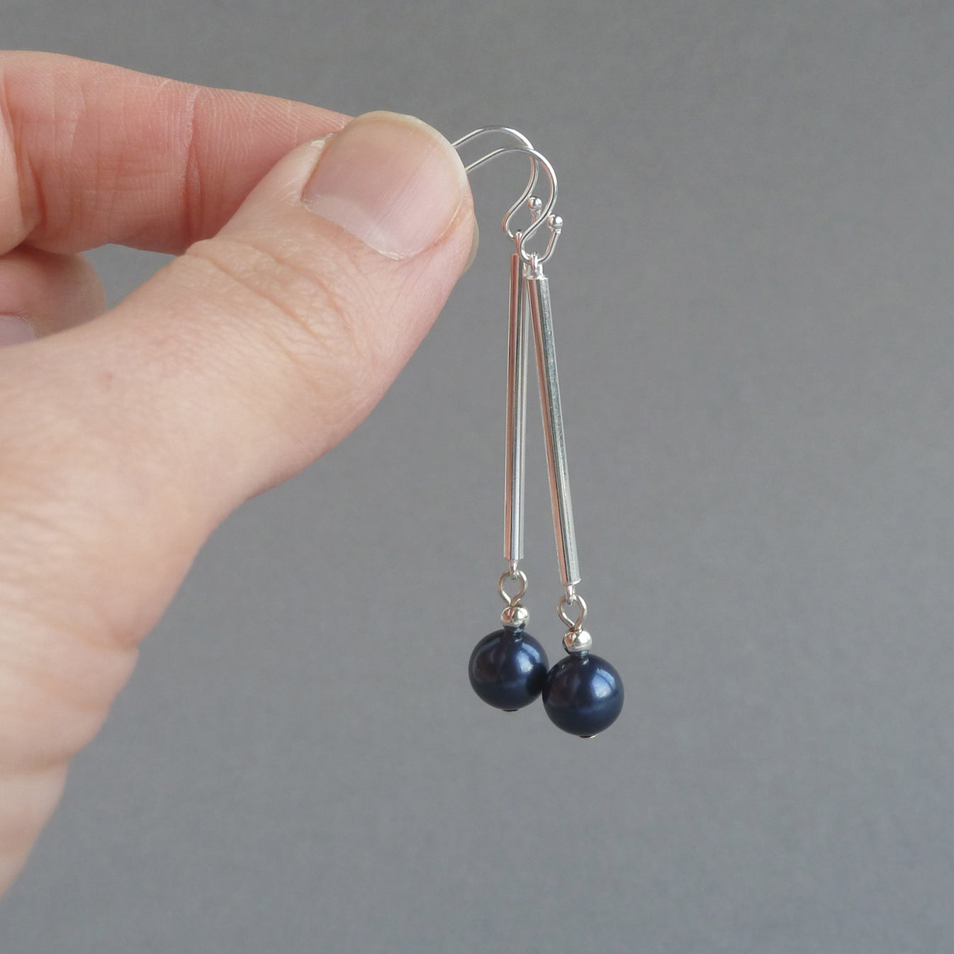 Simple navy blue pearl earrings