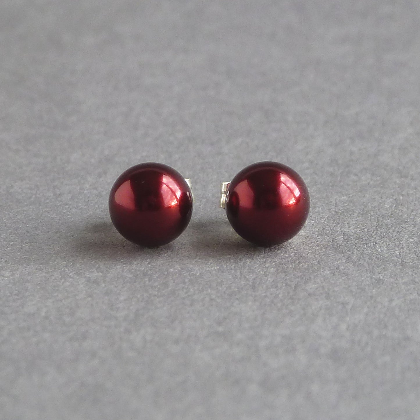 Small burgundy stud earrings