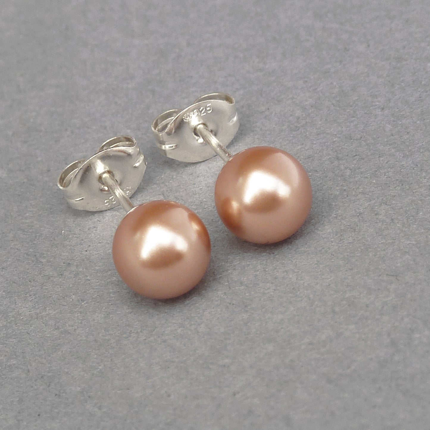 Small copper pearl stud earrings