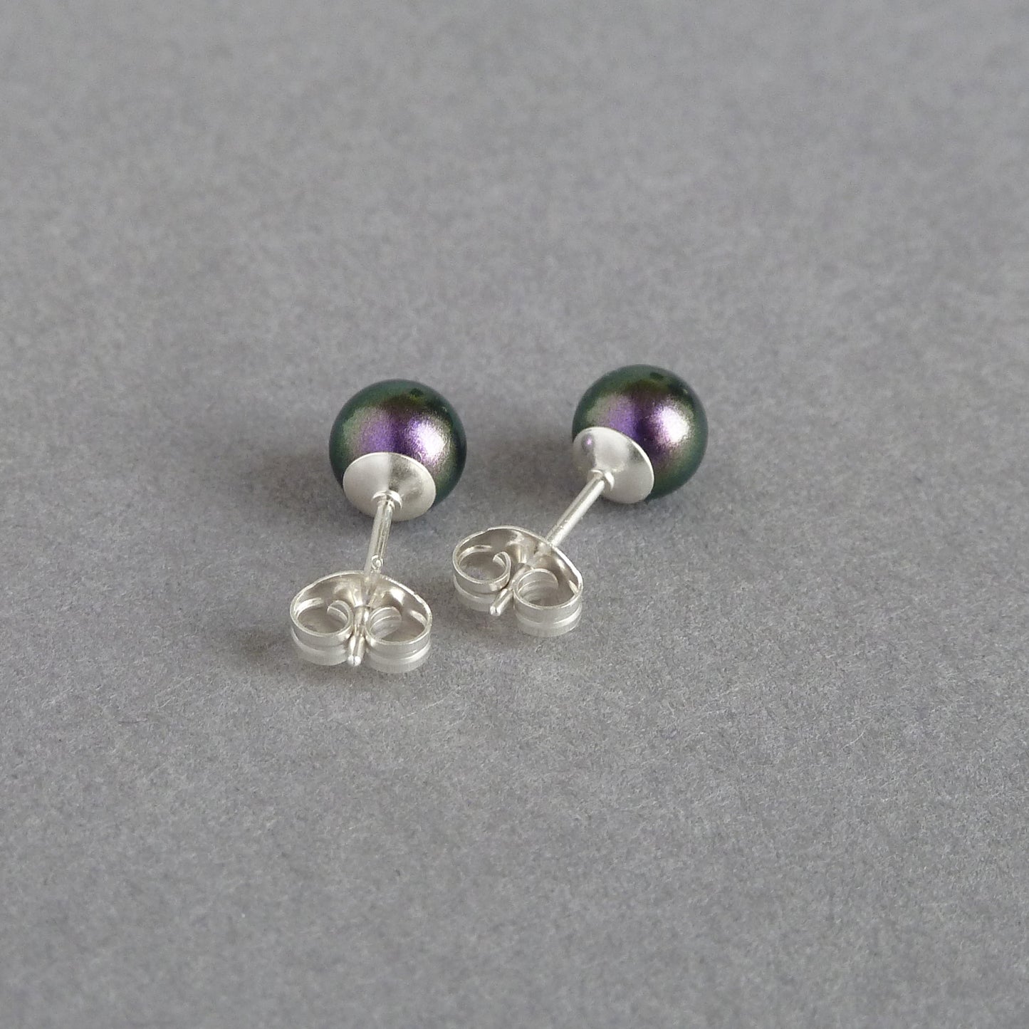 Small dark purple stud earrings