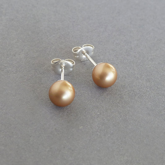 Small gold pearl stud earrings