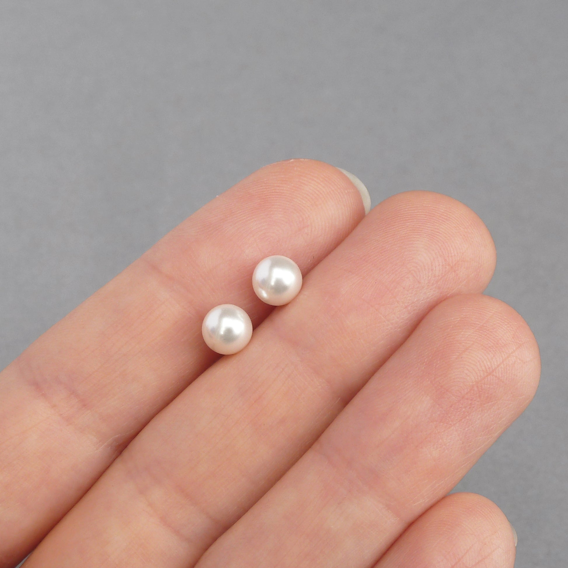Small white pearl studs