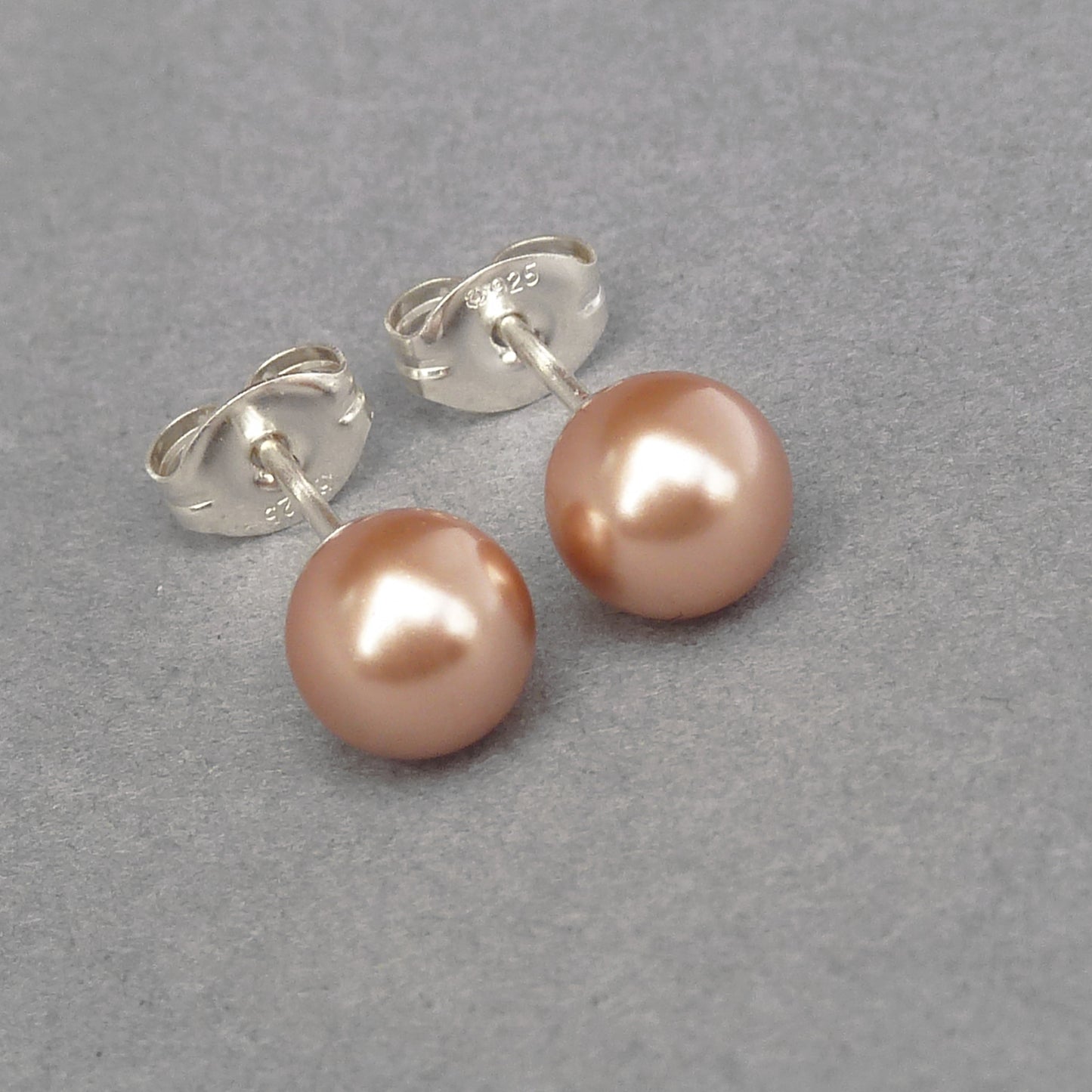 6mm rose gold studs