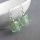 Square pale green earrings