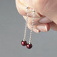 Sterling silver and burgundy pearl dangle earrings