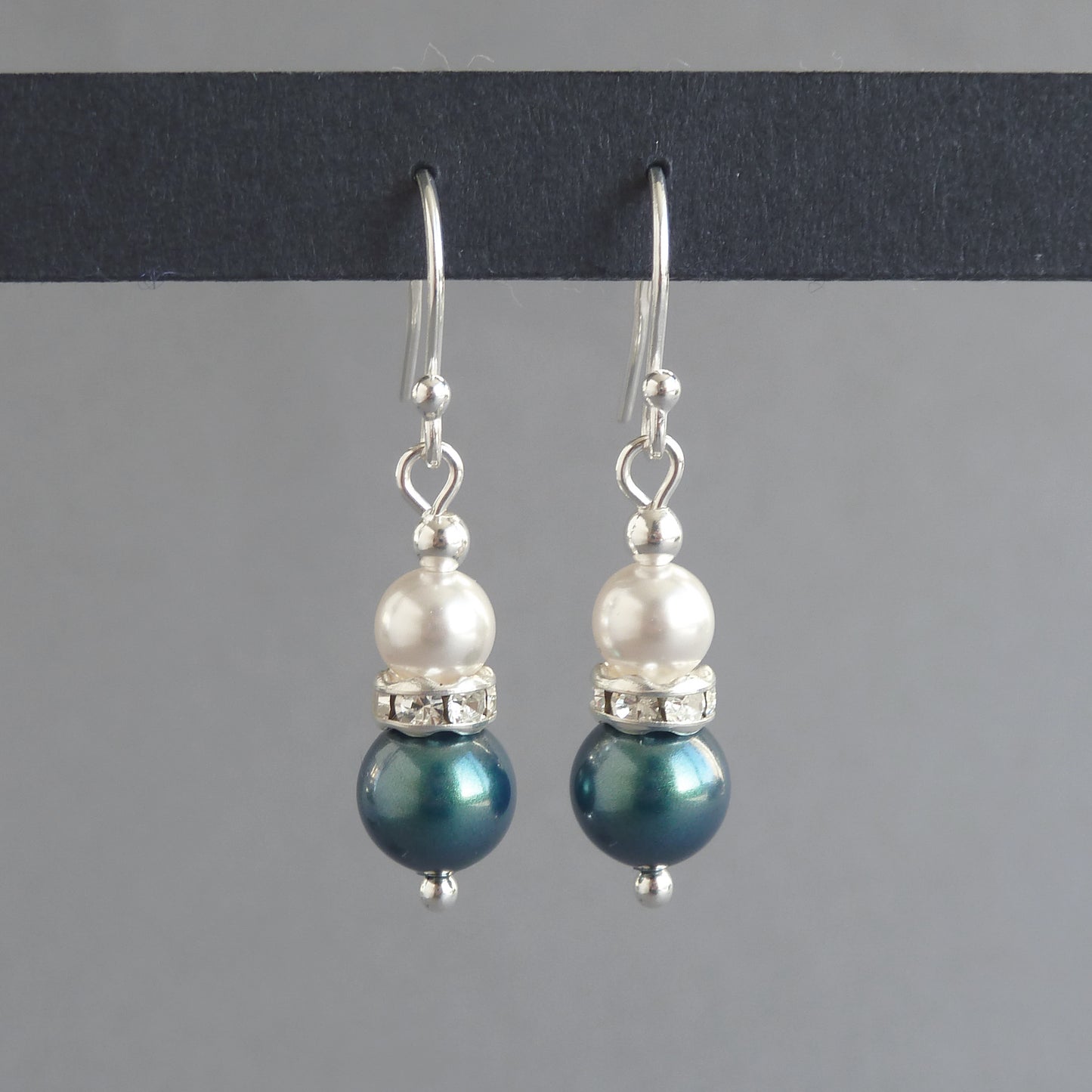 Teal pearl drop earrings with silver hooks